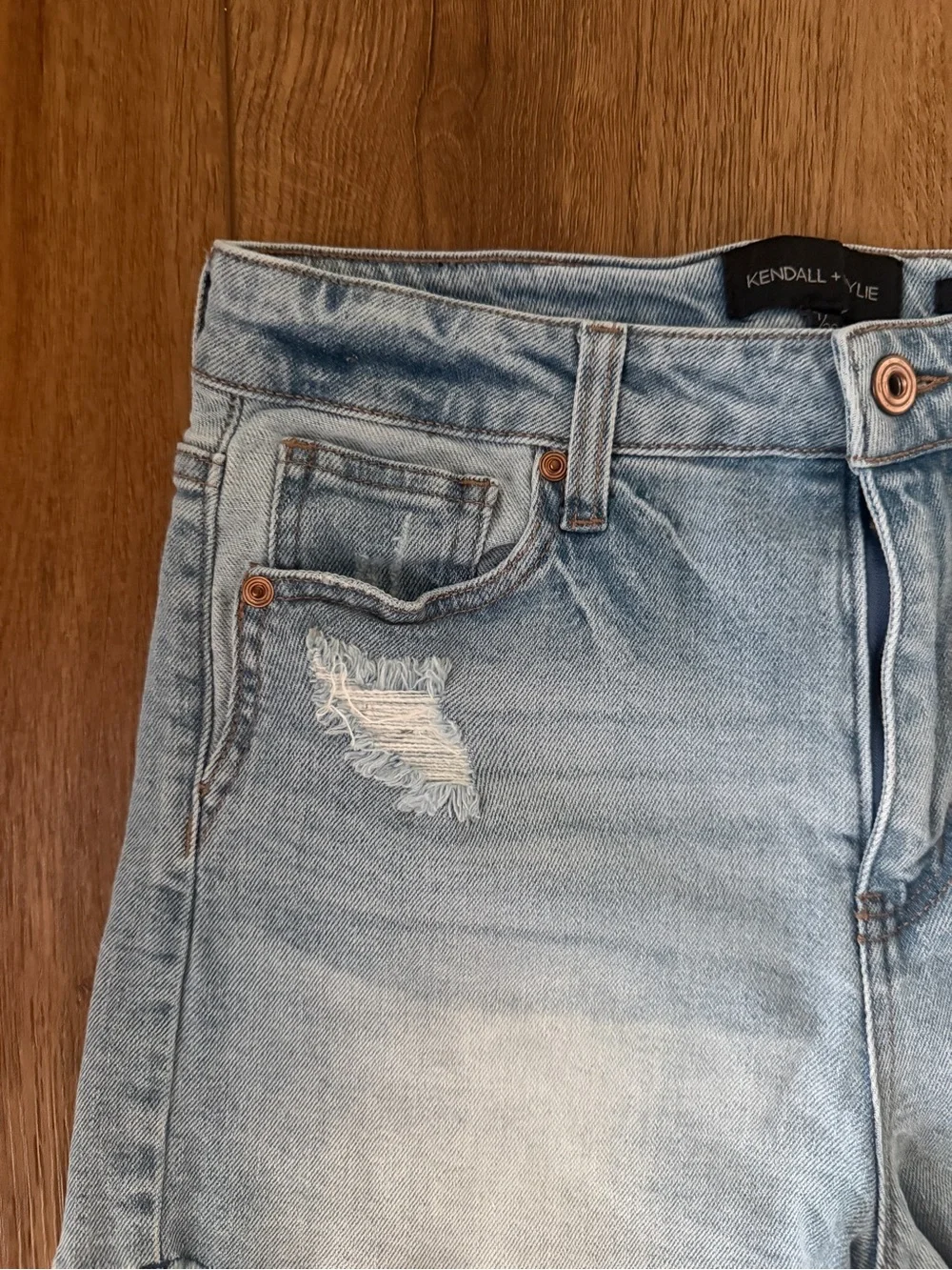 light wash distressed denim shorts